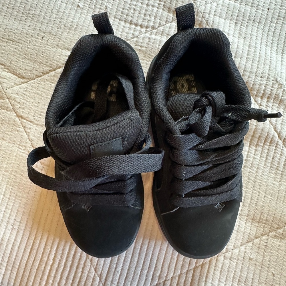 Boys DC soft side feeling black sneakers. Like new worn once.